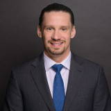 Photo of Adam J. Schleis